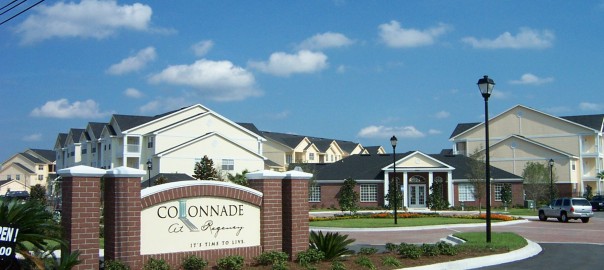 Monument sign visible from road for Colonnade at Regency.