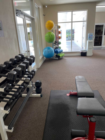 Fitness Center at Asbury Park- Free weights, bench, exercise balls, yoga mats, and resistance bands.